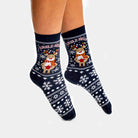 Weihnachtssocken mit Rentier und Schnee
